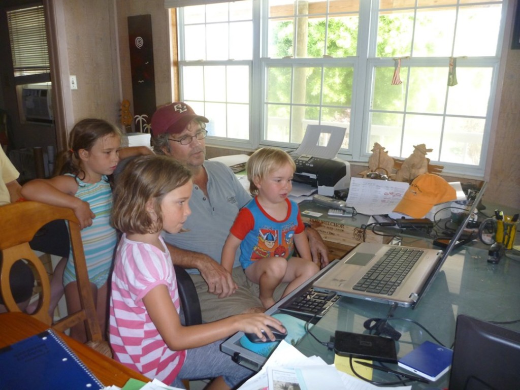 Project Grouper Moon is also a family affair at the home of Peter Hillenbrand, who is seen here with the Semmens children. Their parents Christy and Brice are project scientists. Photo courtesy of the Grouper Moon Project.