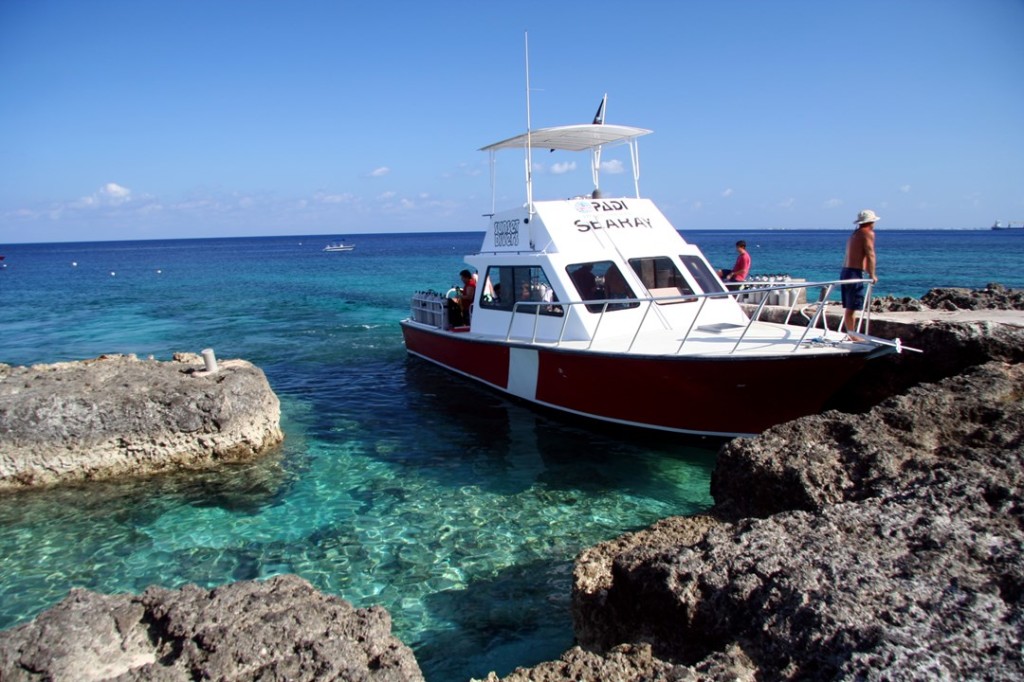 Sunset Divers offers daily boat trips to Grand Cayman's prime dive sites aboard customized dive boats conveniently docked just yards from the resort. Photo courtesy Sunset House.