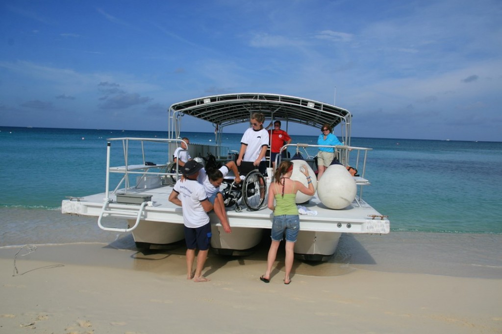 Dive boats pull up on Seven Mile Beach for easy loading. Photo courtesy Red Sail Sports.