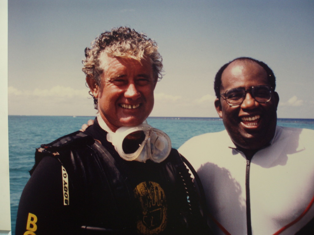 Divemaster Pat Kenney with NBC's Al Roker after introducing him to Cayman's stingrays in 1989. The network featured Stingray City several times and the ray's fame grew.